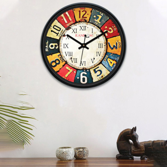 https://daiseyfashions.com/products/multicoloured-round-printed-analogue-wall-clock-30-cm