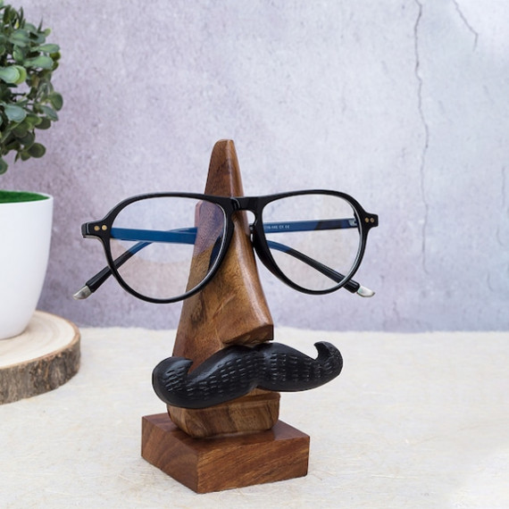 https://daiseyfashions.com/products/brown-handcrafted-eyeglass-holder-showpiece