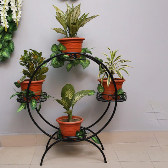 https://daiseyfashions.com/products/set-of-4-black-solid-metal-planters-with-round-shaped-stand