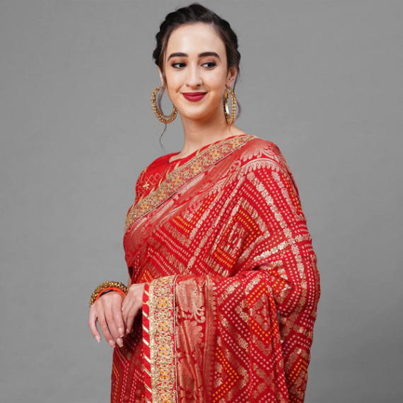 https://daiseyfashions.com/products/red-gold-toned-woven-design-bandhani-saree